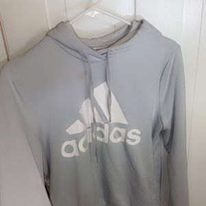 Baby blue women’s Adidas hoodie, runs small